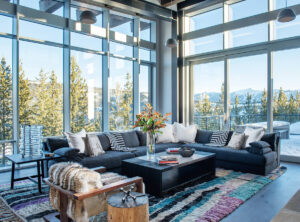 yellowstone club living room glass walls spacious bright light