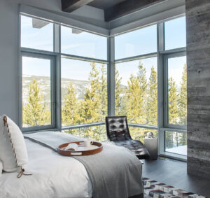 yellowstone club bedroom glass wall wood beams