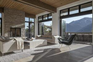 yellowstone club living rooom stone fire place patio dining