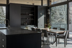 Sage Residence dining room bright dark cabinets light