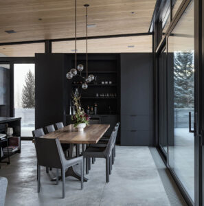 Sage Residence dining room spacious glass walls glass sliding doors bright