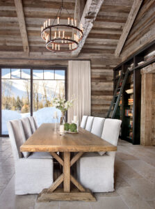 East fork dining table wood paneling wood beams library