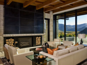 Timber Gulch living room wood beams fire place