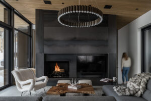 Sage Residence living room spacious glass walls fire place