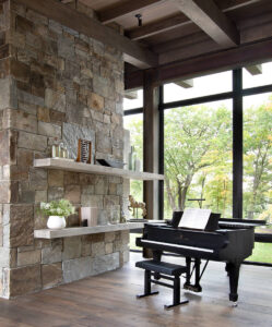 Lake Minnetonka living room stone wall glass walls