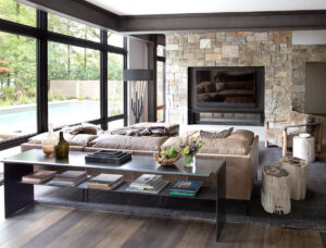 Lake Minnetonka living room stone fireplace bright glass wall